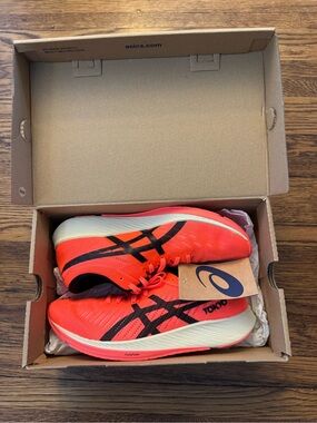 Asics Metaracer Tokyo size 8 1/2. Vibrant orange upper with black ASICS stripes.